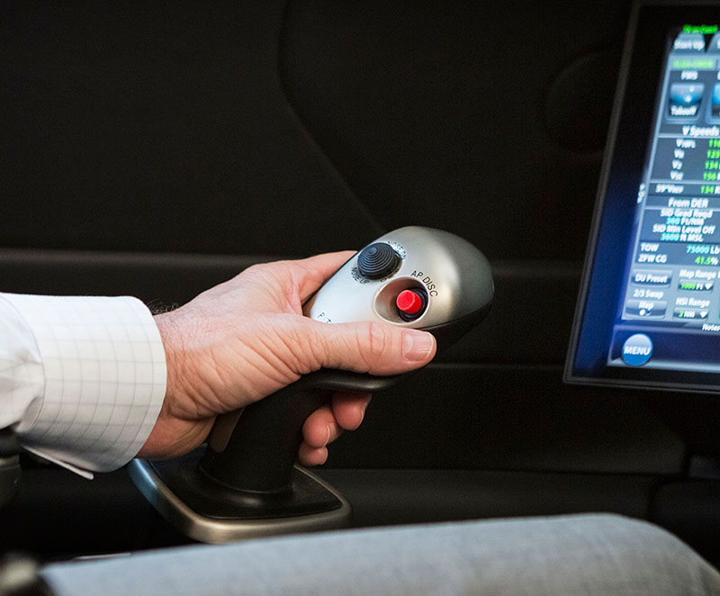 G500 flight deck detail showing an active control sidestick