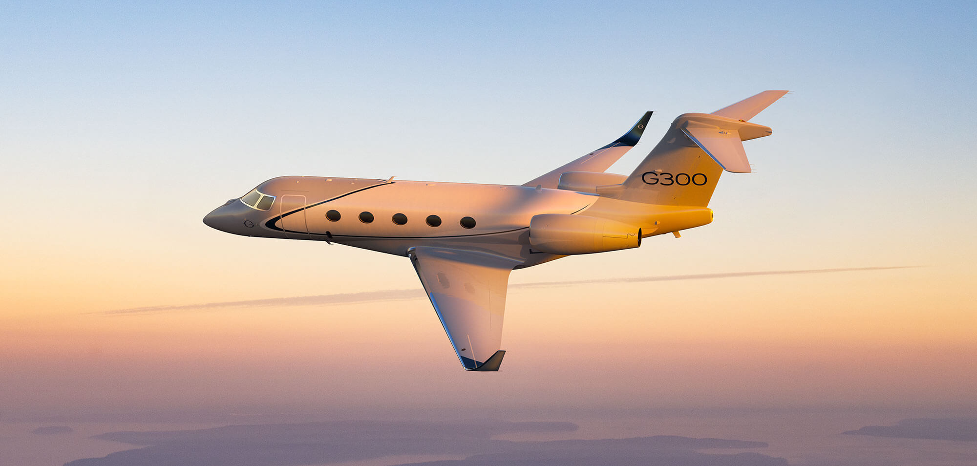 A Gulfstream G300 lit by a sunrise, banks above a a distant coastline.