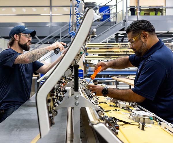Gulfstream employees assemble a component in Gulfstream's Appleton, Wisconsin, facility.