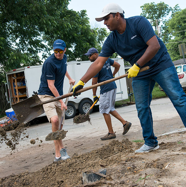 Gulfstream volunteers work on an environmental landscaping project.